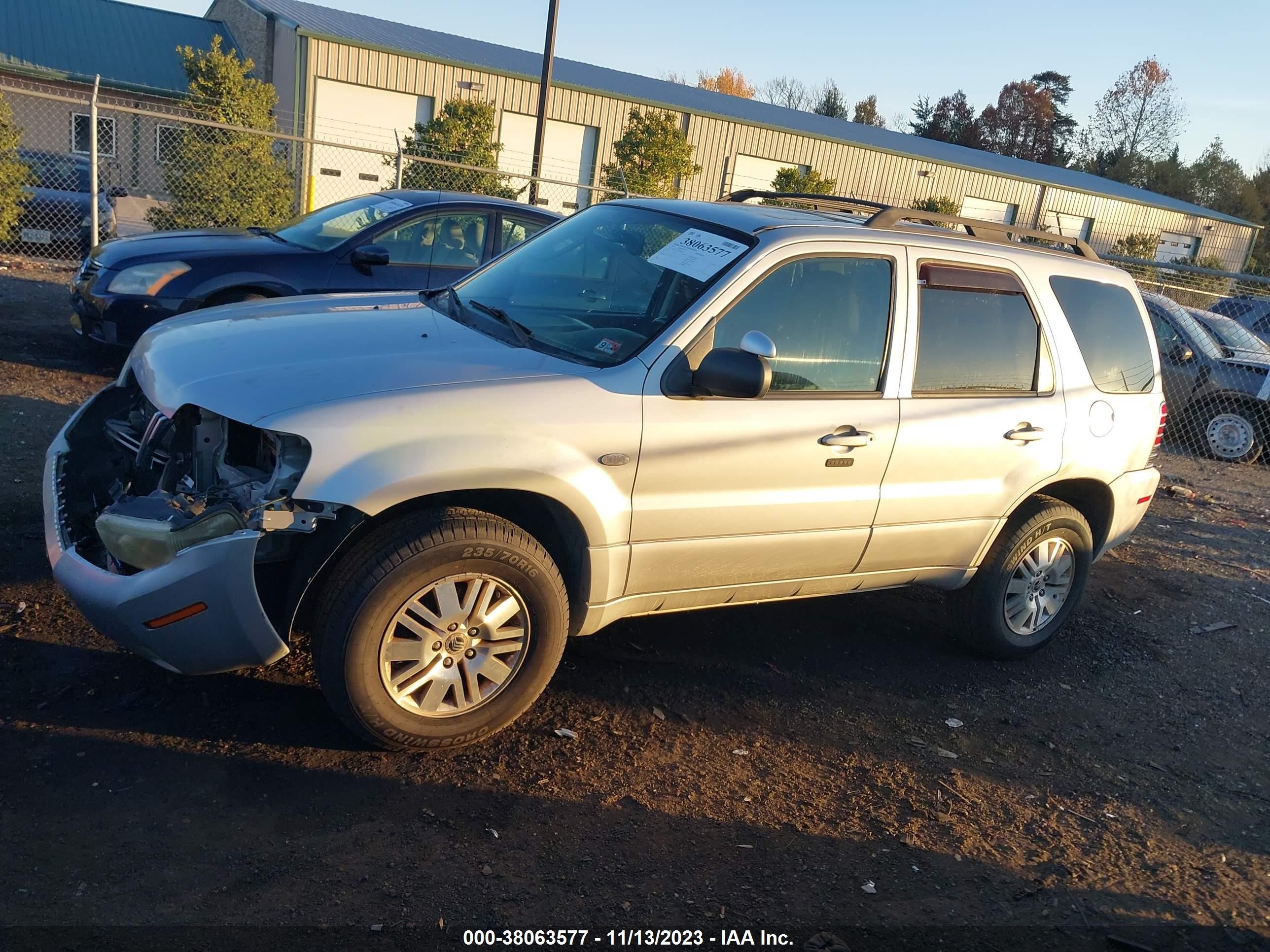 Photo 13 VIN: 4M2CU97147KJ05685 - MERCURY MARINER 