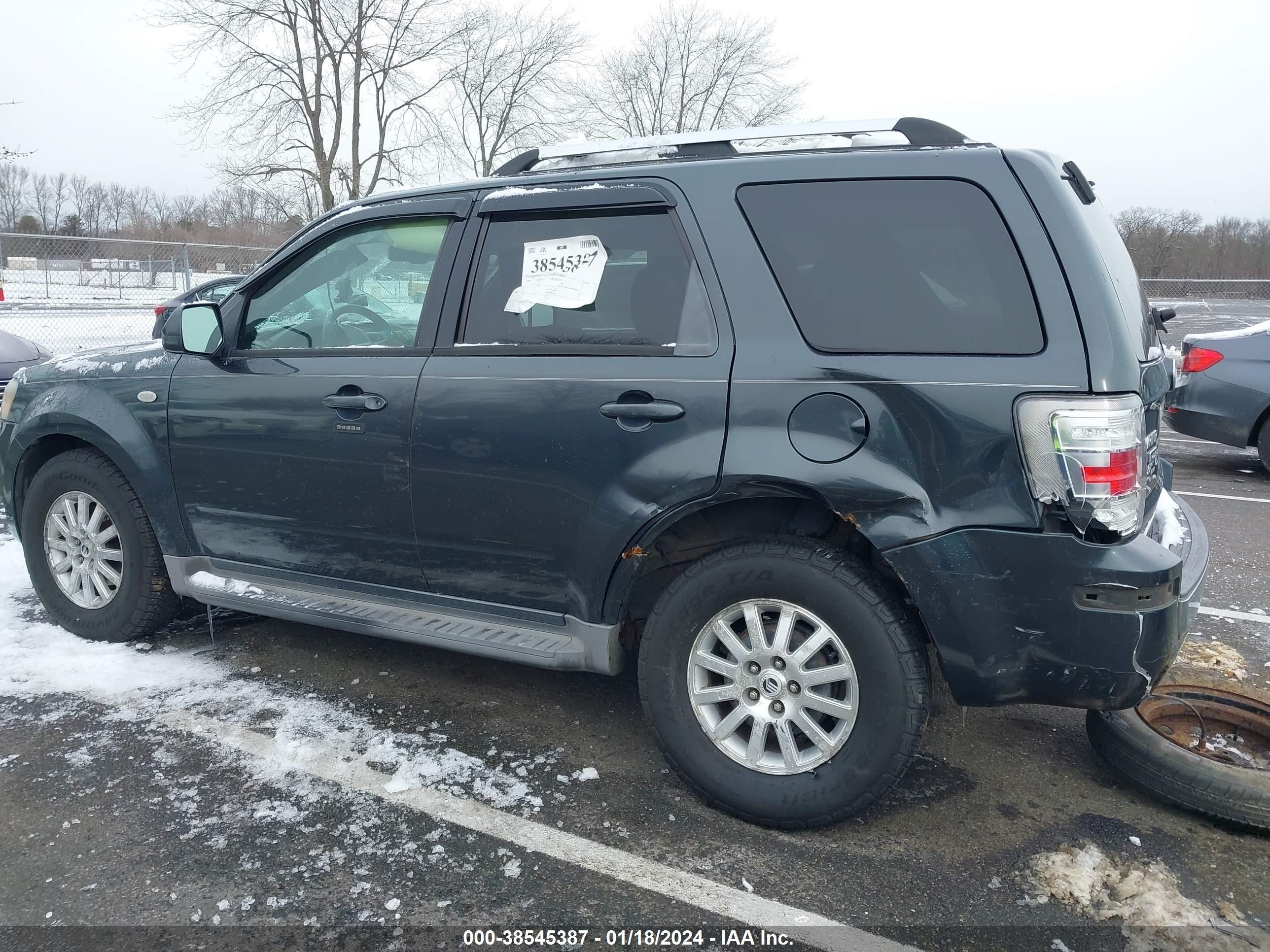 Photo 5 VIN: 4M2CU97G19KJ00497 - MERCURY MARINER 