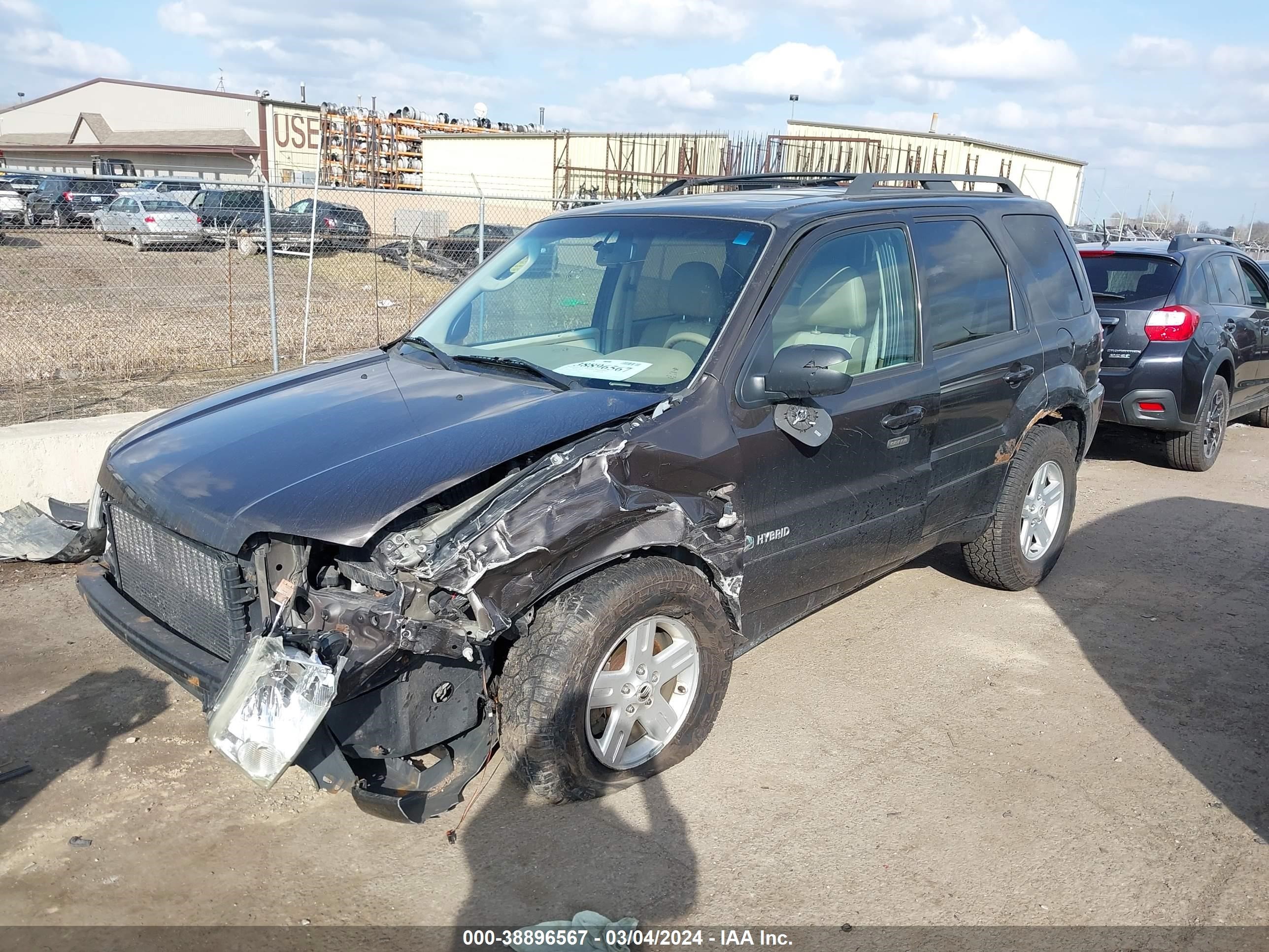 Photo 1 VIN: 4M2CU98H16KJ20588 - MERCURY MARINER 