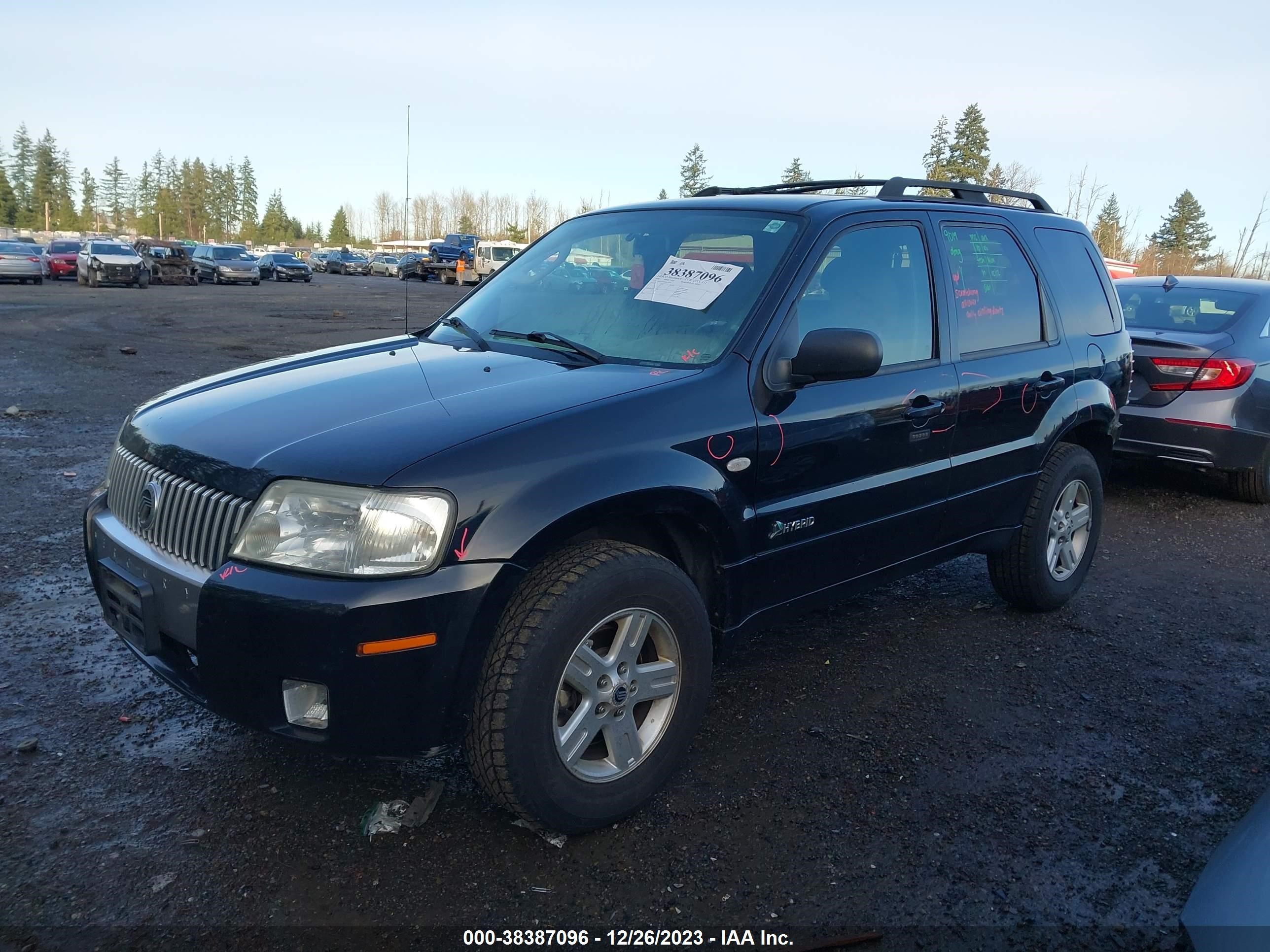 Photo 1 VIN: 4M2CU98H46KJ10301 - MERCURY MARINER 