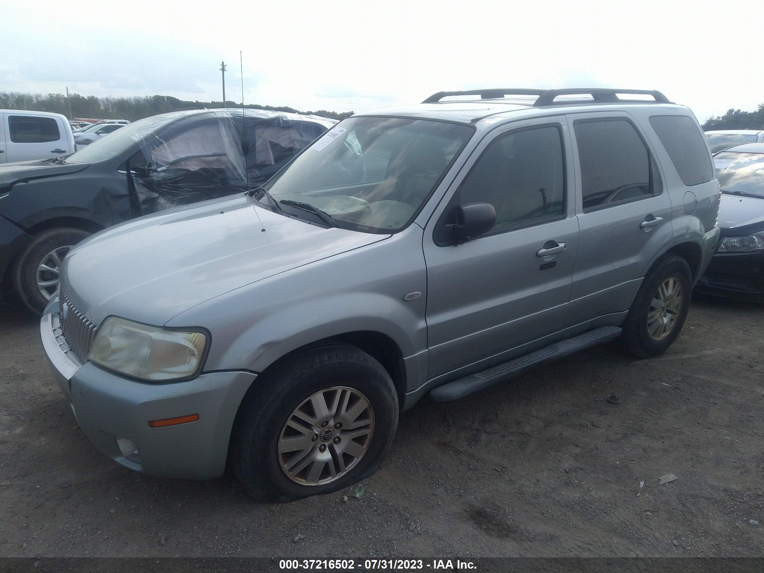 Photo 1 VIN: 4M2YU56165DJ31948 - MERCURY MARINER 