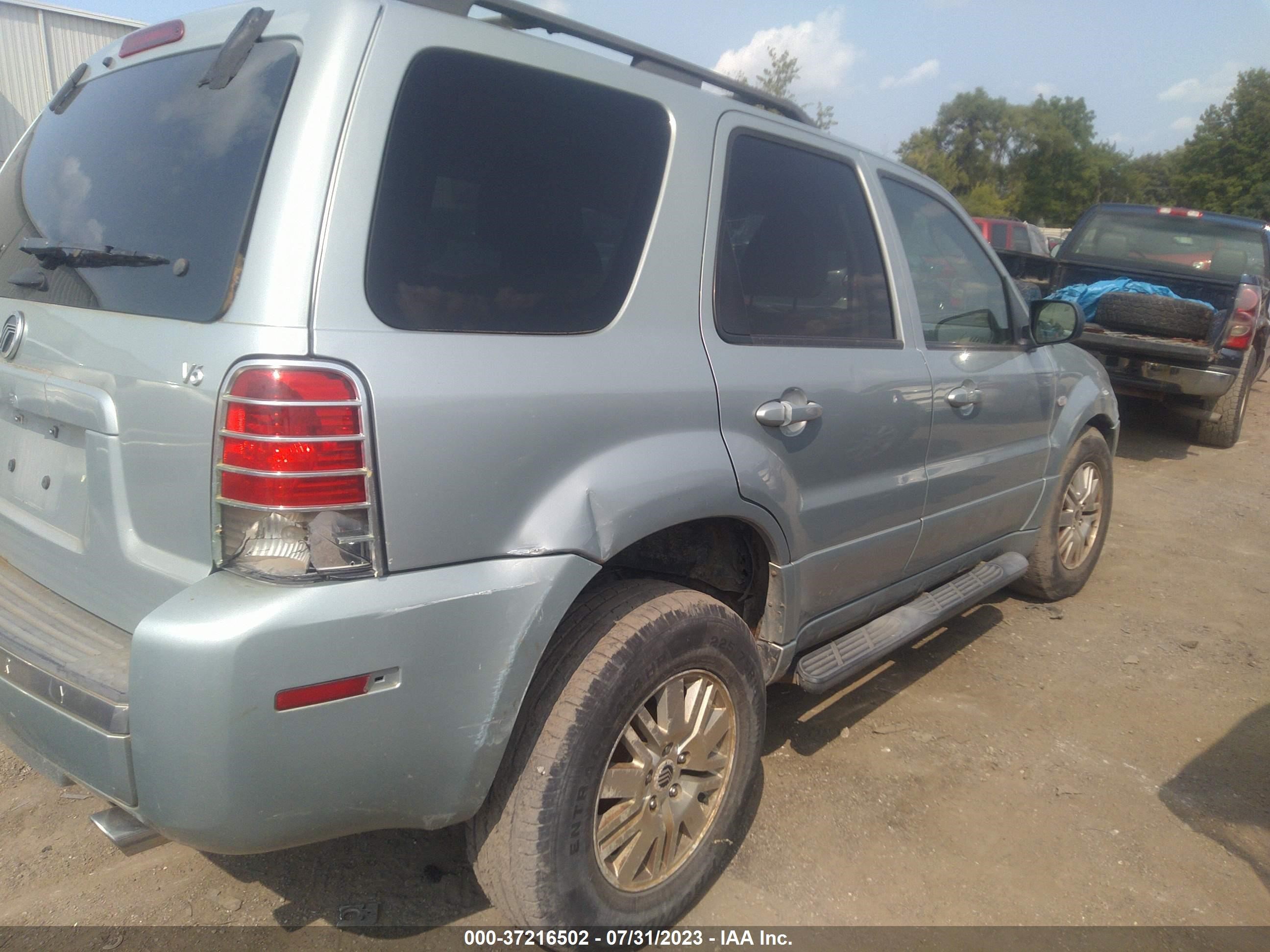 Photo 3 VIN: 4M2YU56165DJ31948 - MERCURY MARINER 