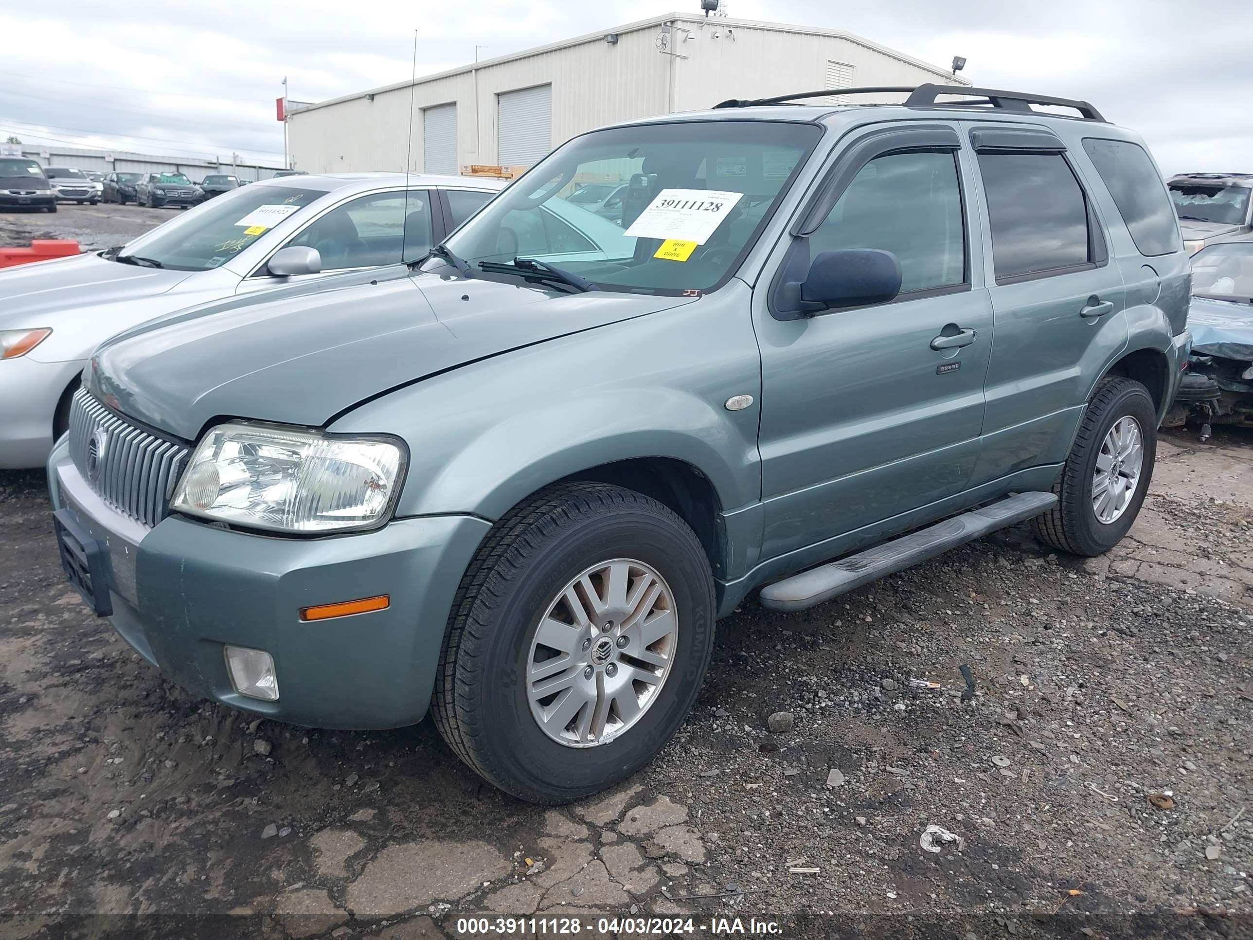 Photo 1 VIN: 4M2YU571X6KJ02545 - MERCURY MARINER 