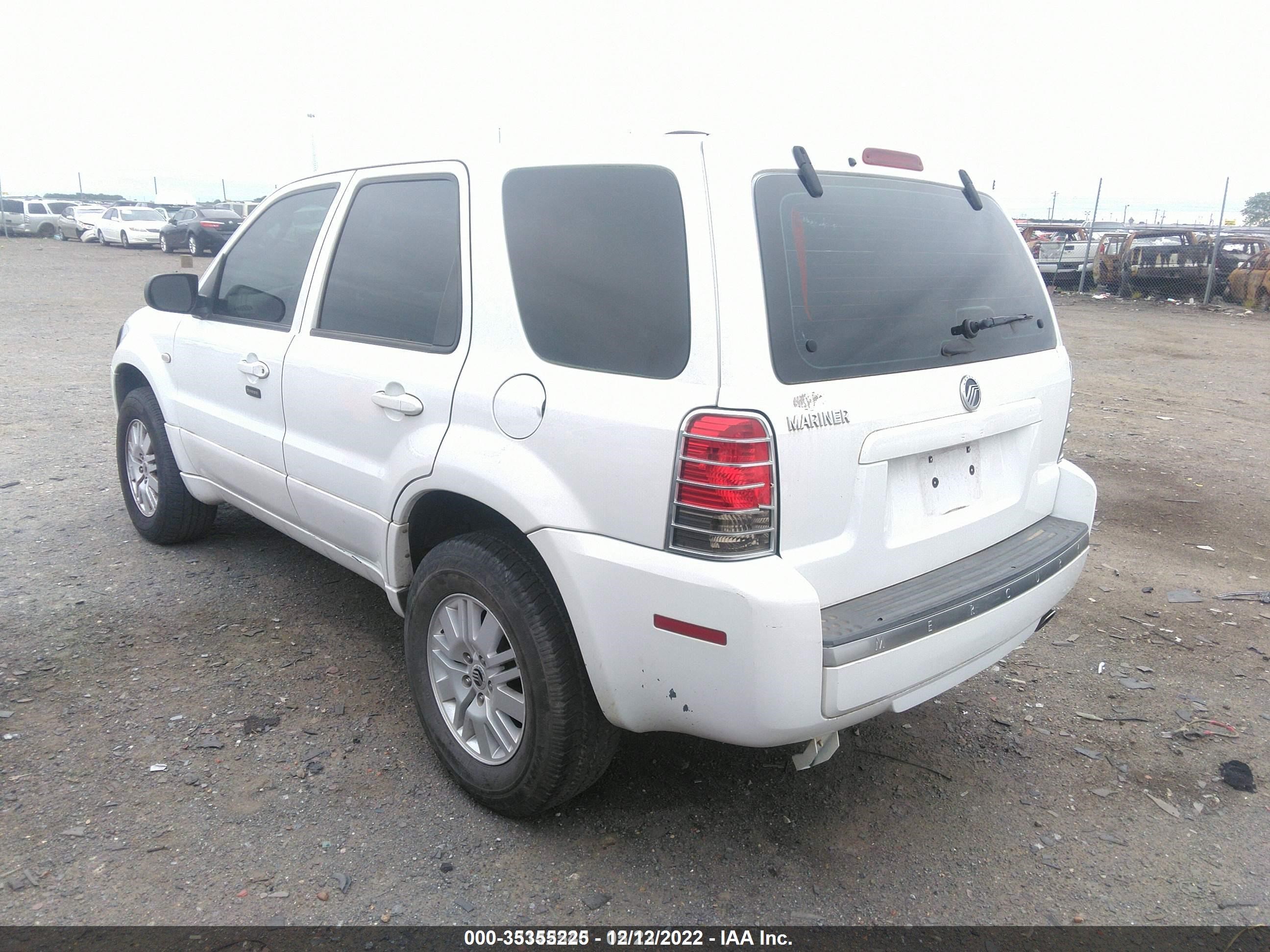 Photo 2 VIN: 4M2YU80Z07KJ13430 - MERCURY MARINER 