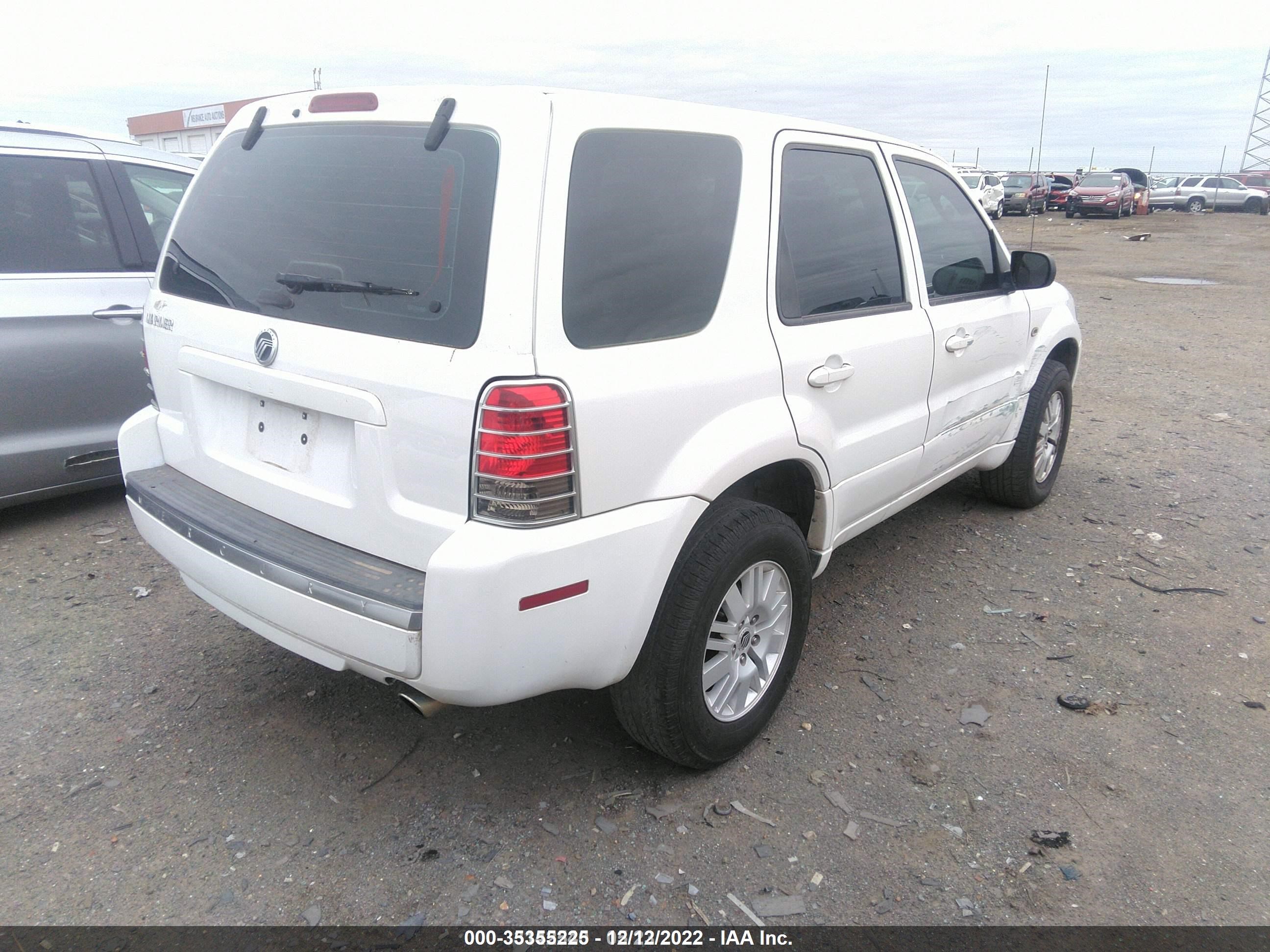 Photo 3 VIN: 4M2YU80Z07KJ13430 - MERCURY MARINER 