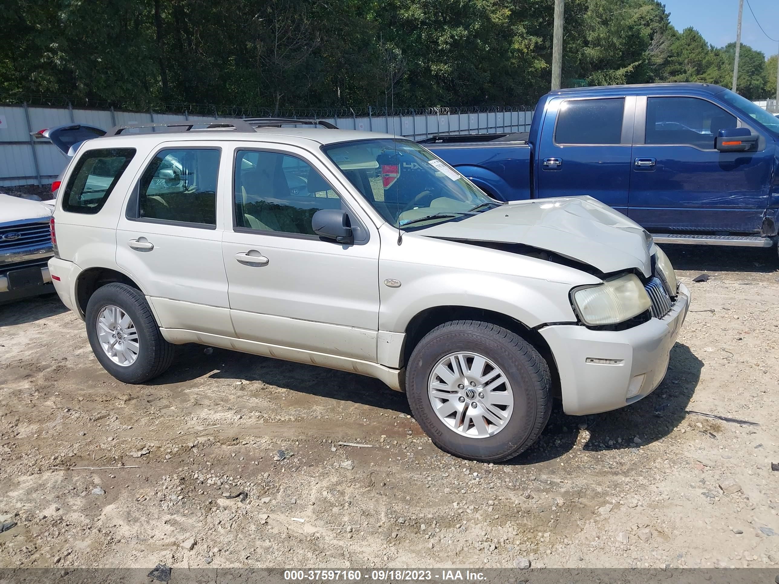 Photo 12 VIN: 4M2YU80Z27KJ16801 - MERCURY MARINER 