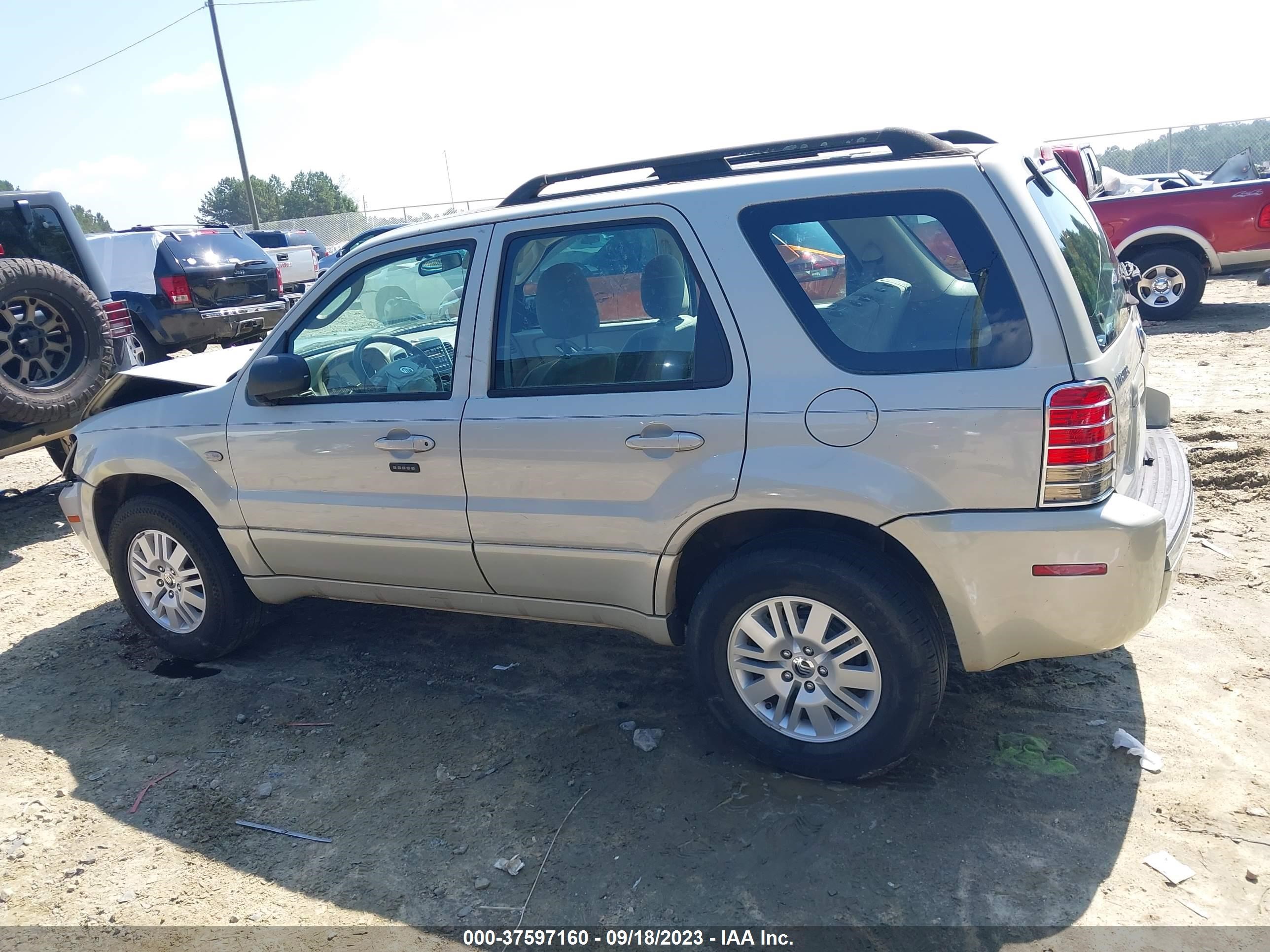 Photo 13 VIN: 4M2YU80Z27KJ16801 - MERCURY MARINER 