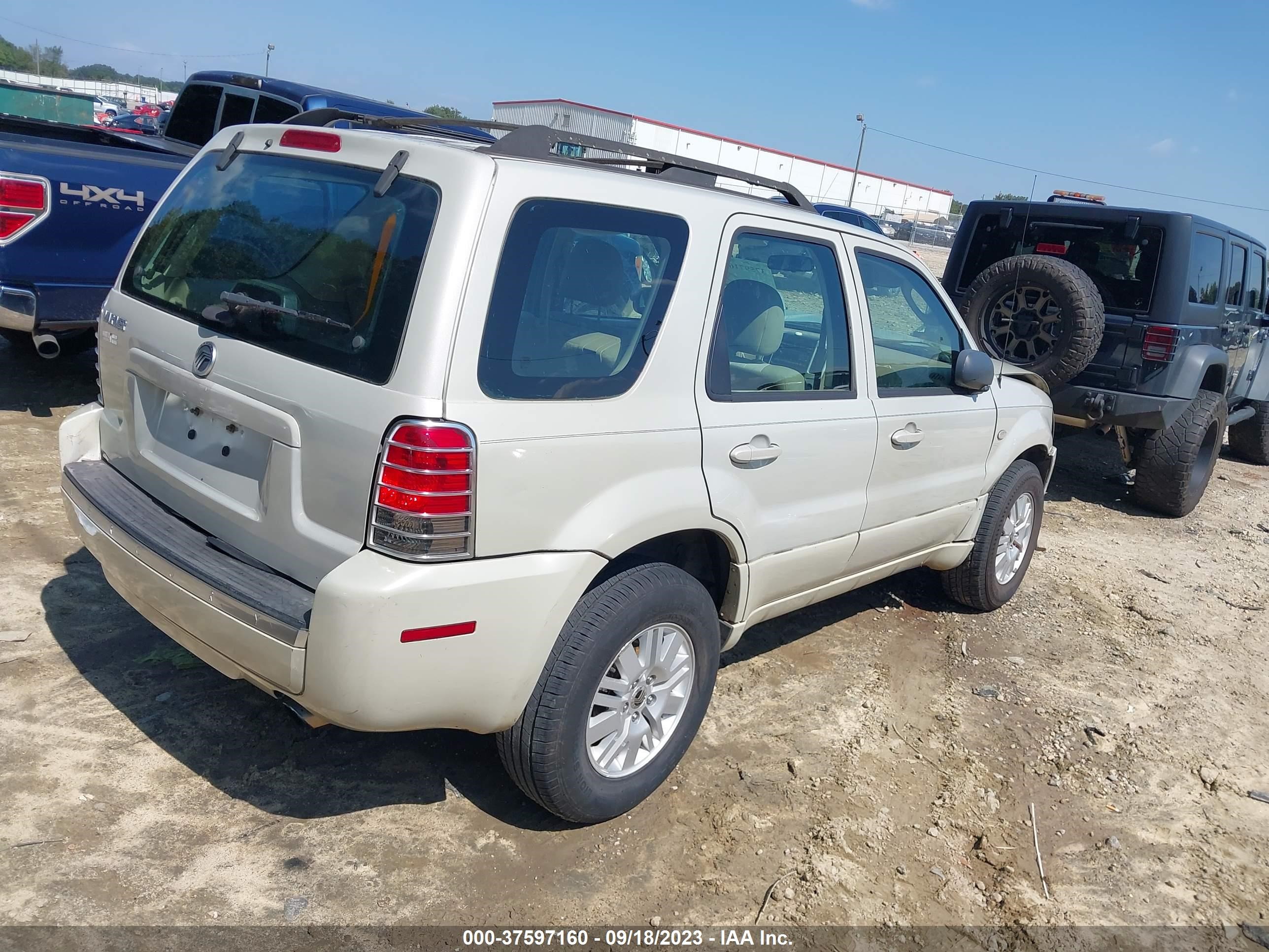 Photo 3 VIN: 4M2YU80Z27KJ16801 - MERCURY MARINER 