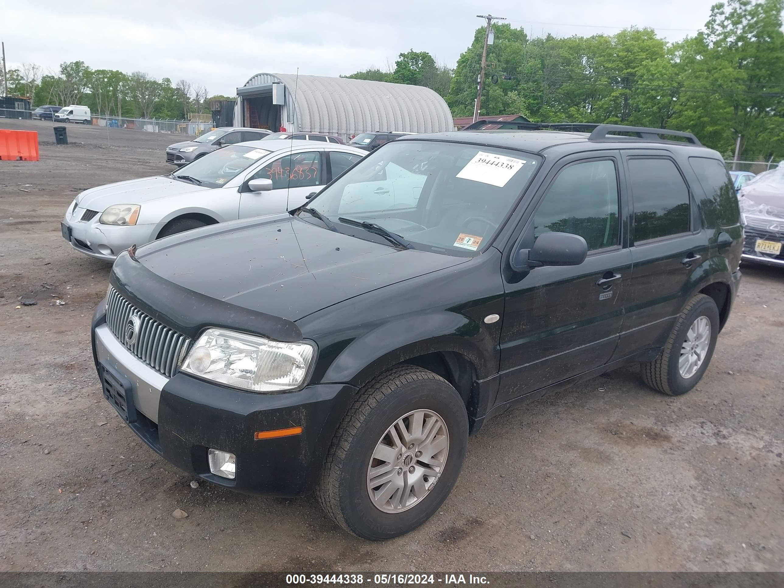 Photo 1 VIN: 4MTCU57186KJ19483 - MERCURY MARINER 