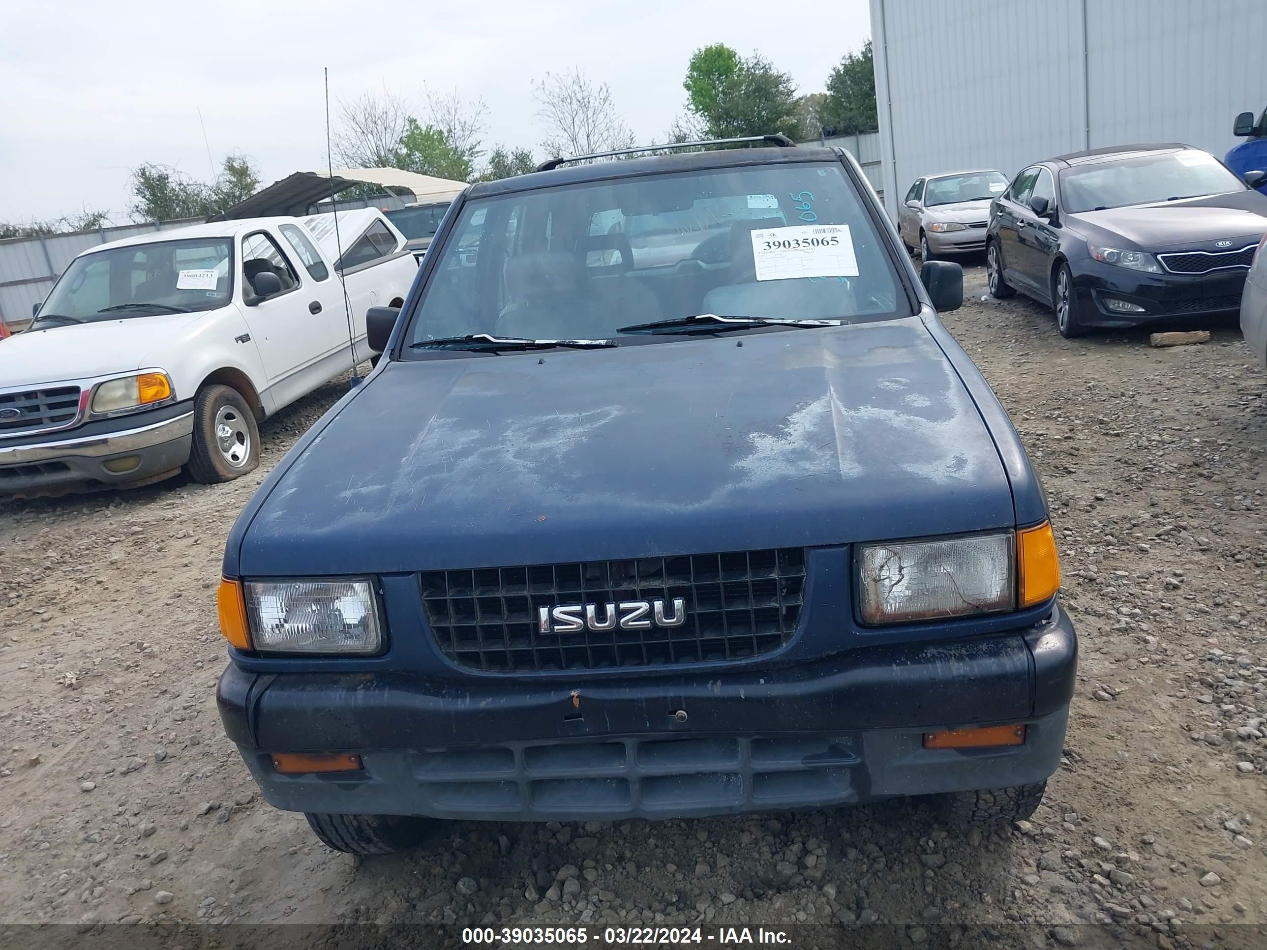 Photo 11 VIN: 4S2CG58V6P4320050 - ISUZU RODEO 