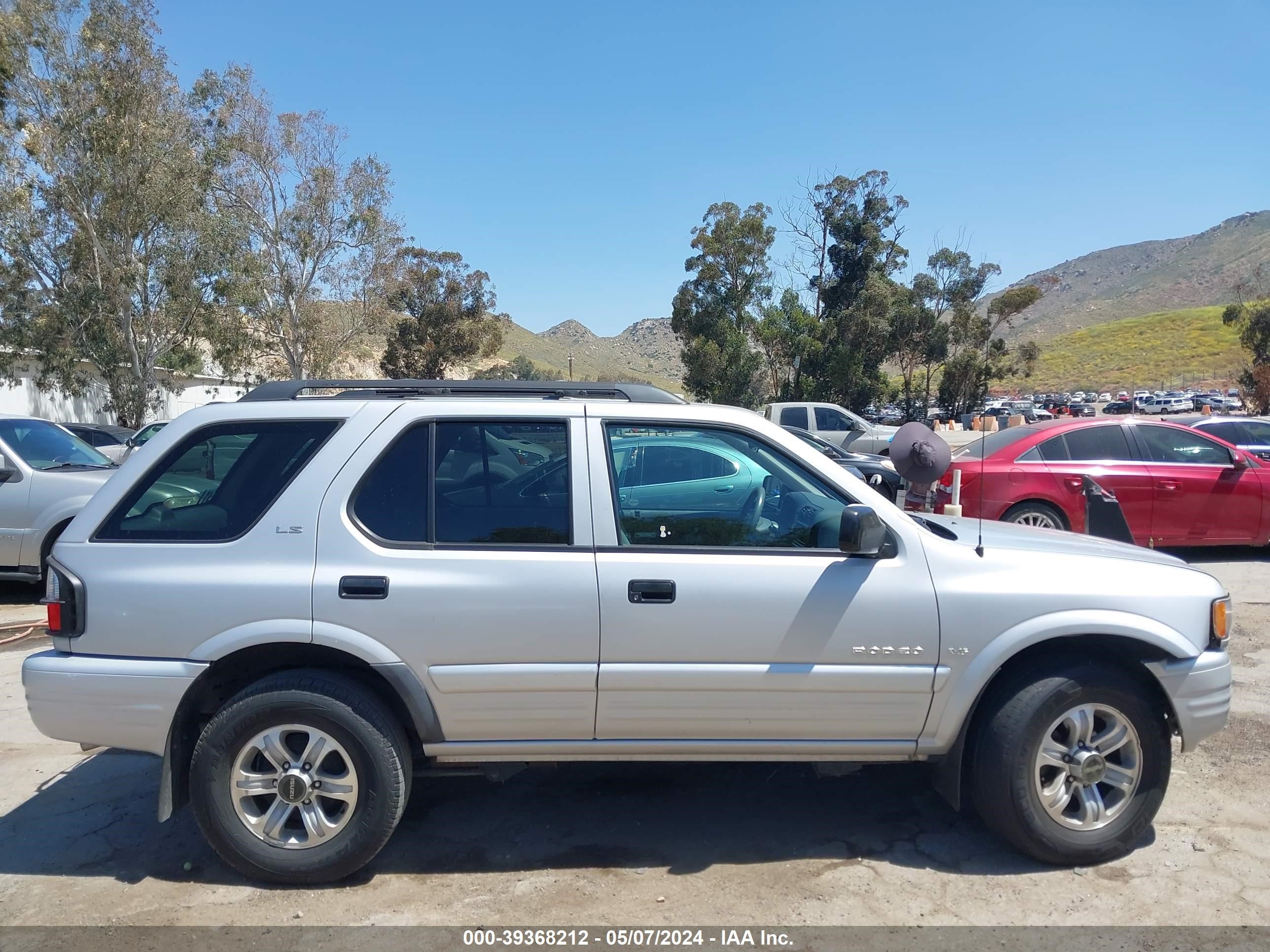 Photo 12 VIN: 4S2CK58W614362989 - ISUZU RODEO 