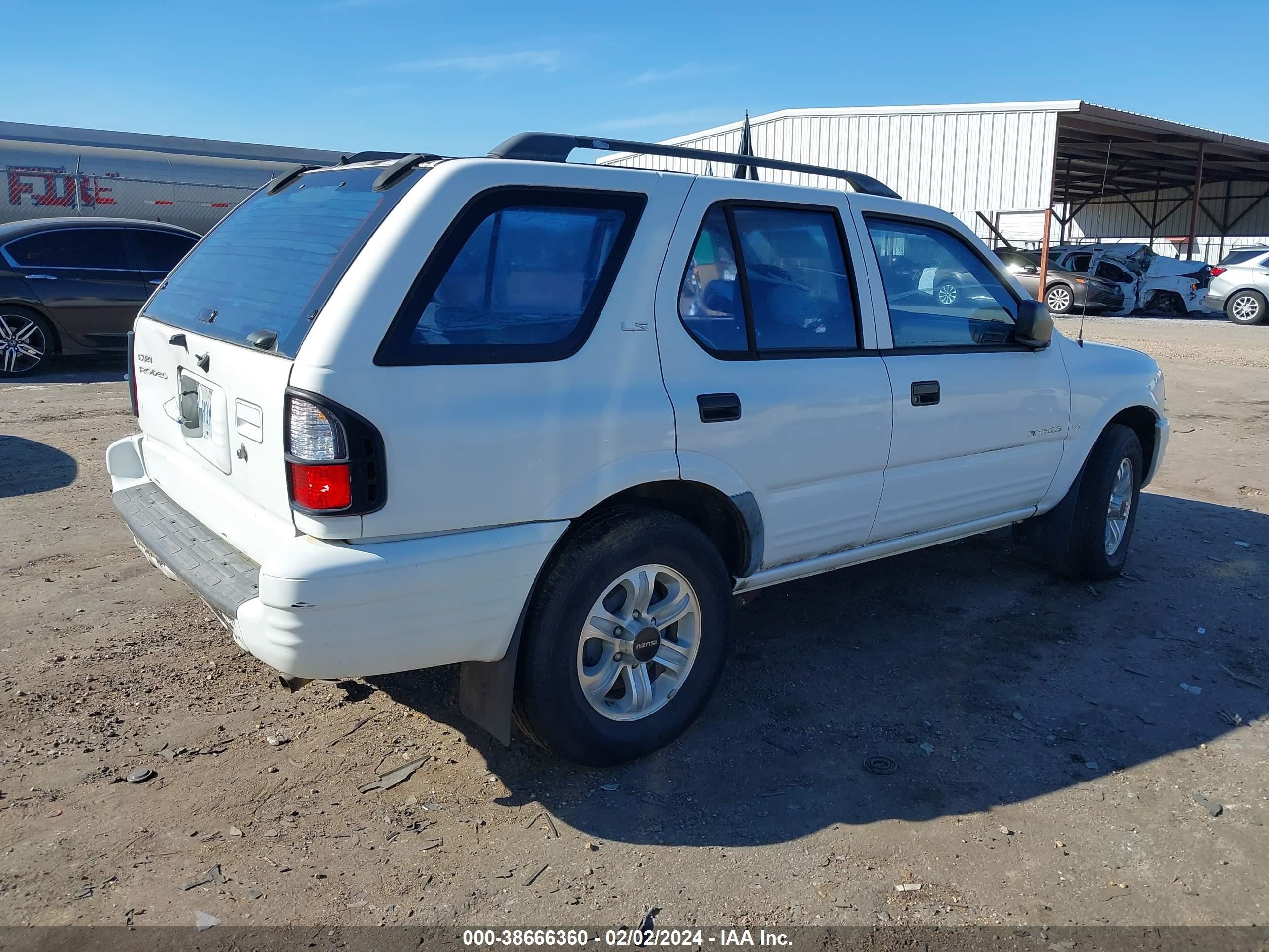 Photo 3 VIN: 4S2CK58W9Y4300321 - ISUZU RODEO 