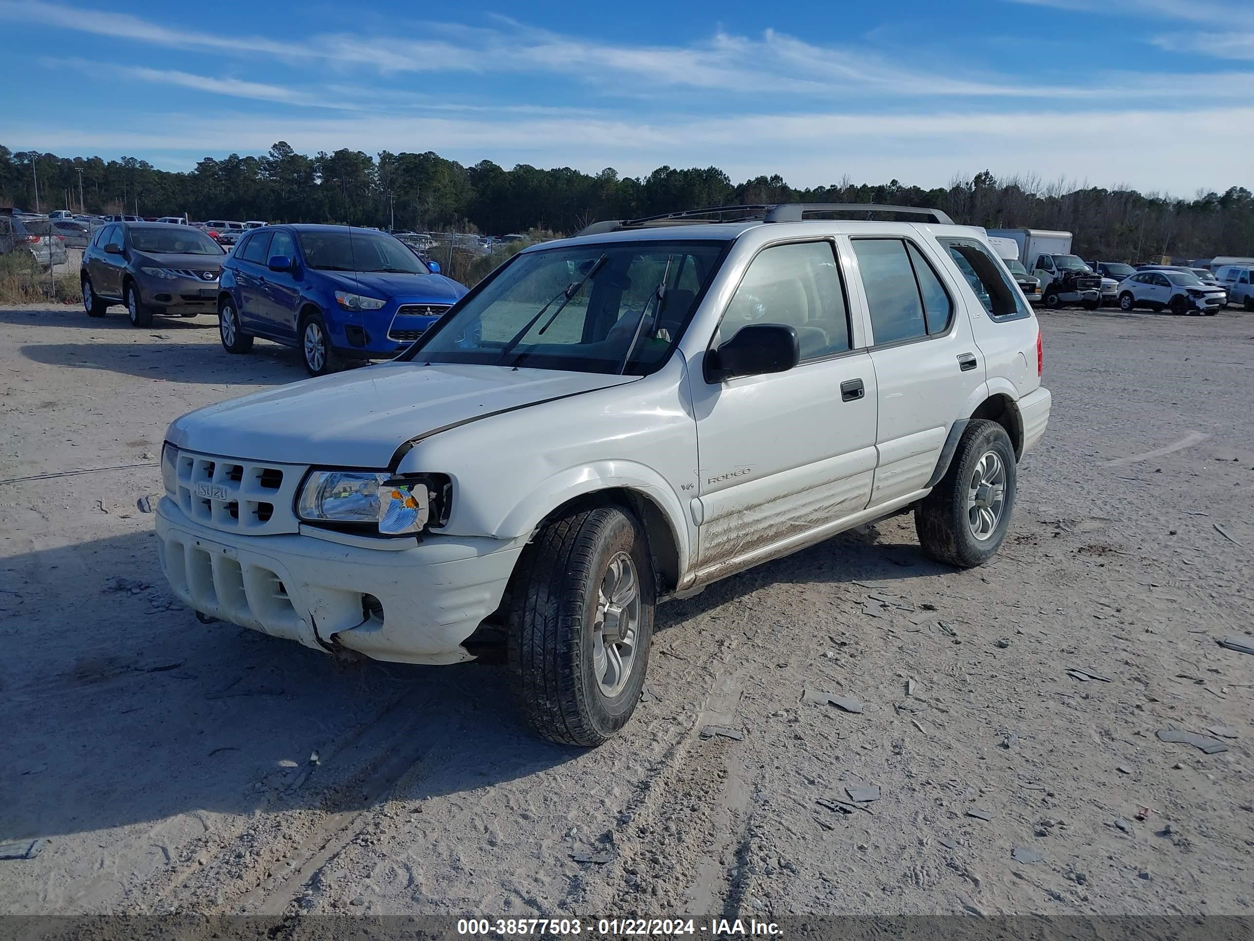 Photo 1 VIN: 4S2CK58WXY4348524 - ISUZU RODEO 