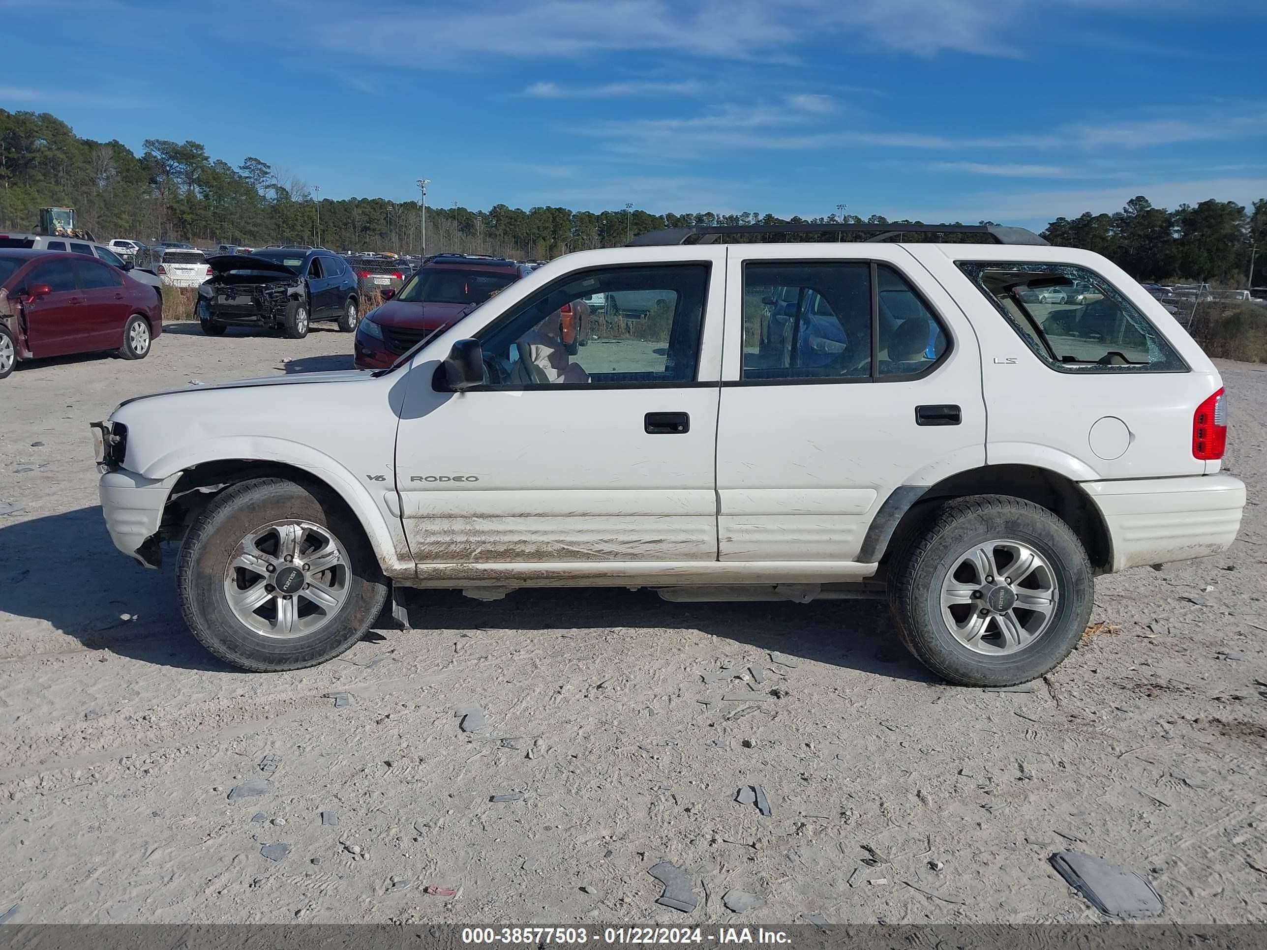 Photo 13 VIN: 4S2CK58WXY4348524 - ISUZU RODEO 