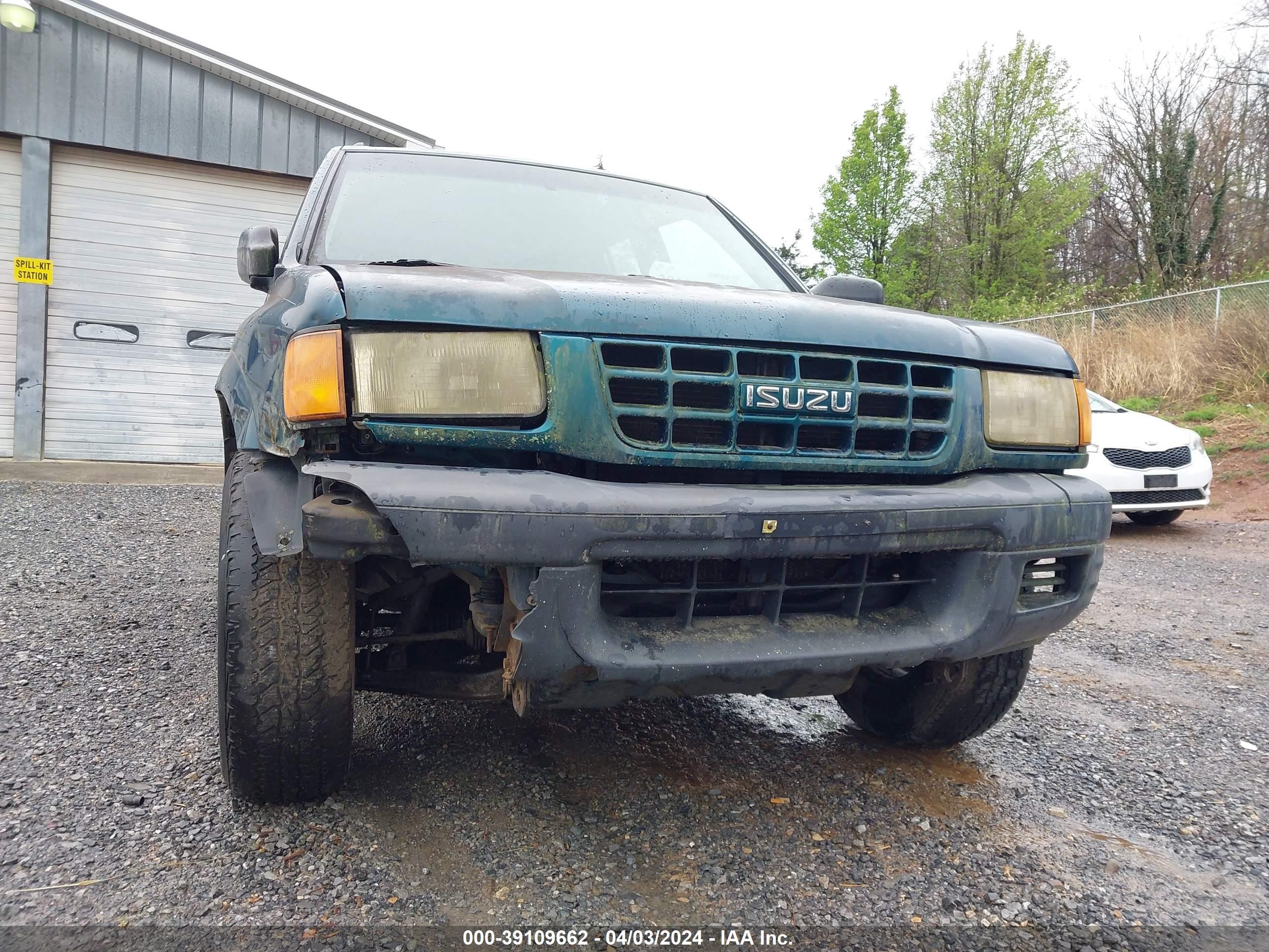 Photo 11 VIN: 4S2CM58W5X4319036 - ISUZU RODEO 