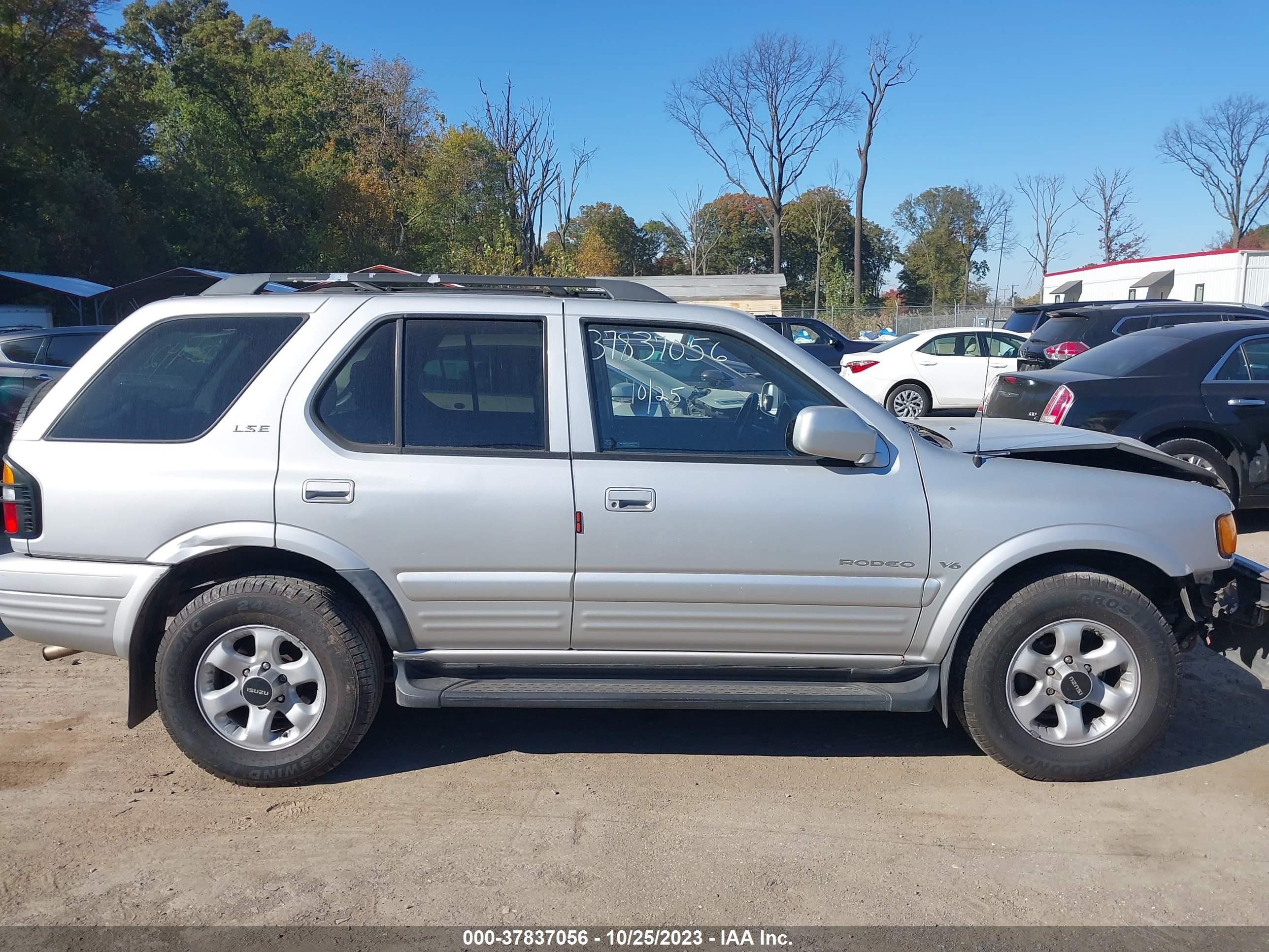 Photo 12 VIN: 4S2CM58W8X4376816 - ISUZU RODEO 