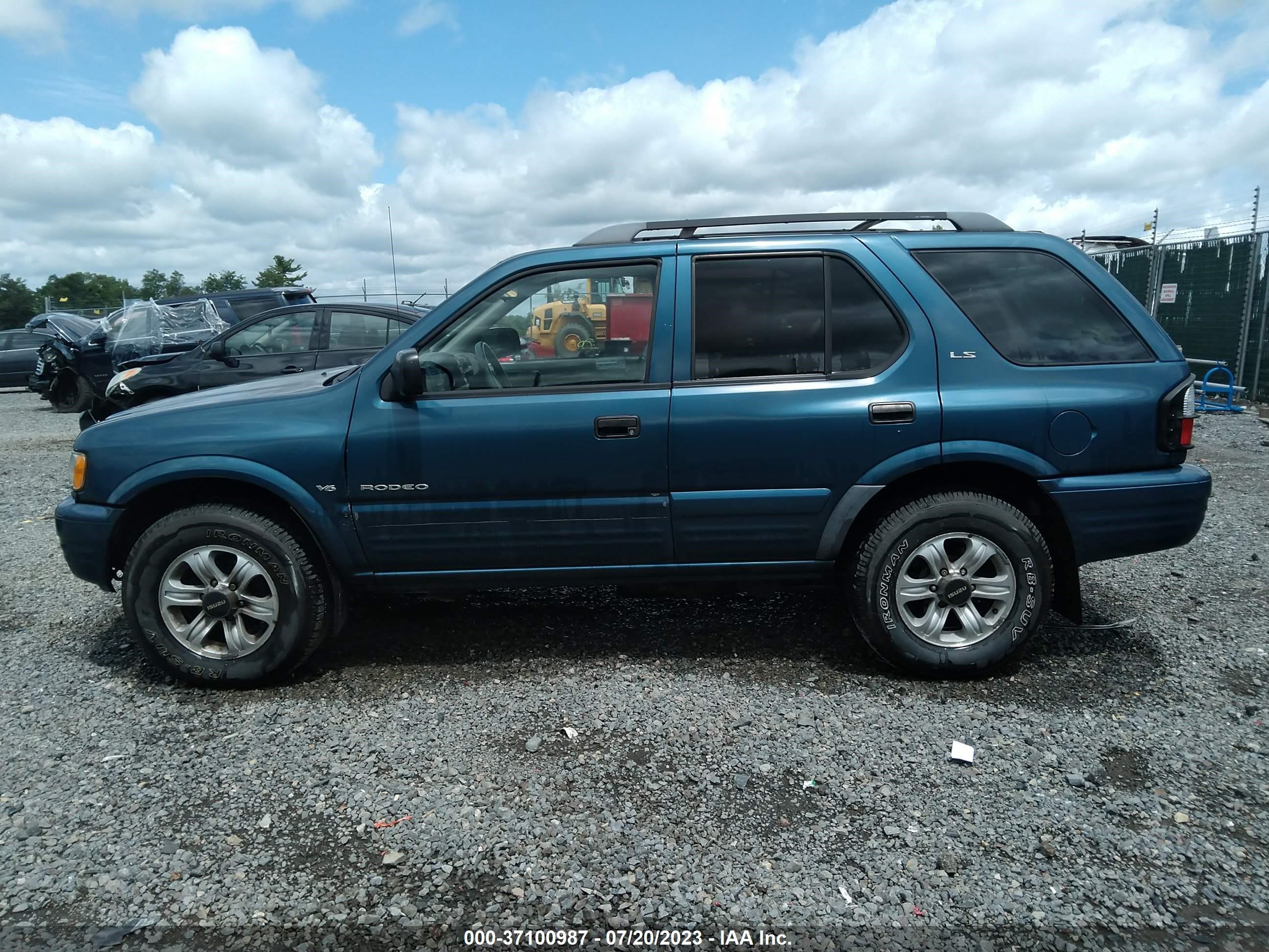 Photo 13 VIN: 4S2DM58W414308878 - ISUZU RODEO 