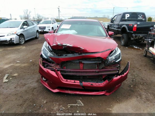 Photo 5 VIN: 4S3BNAF64J3023082 - SUBARU LEGACY 