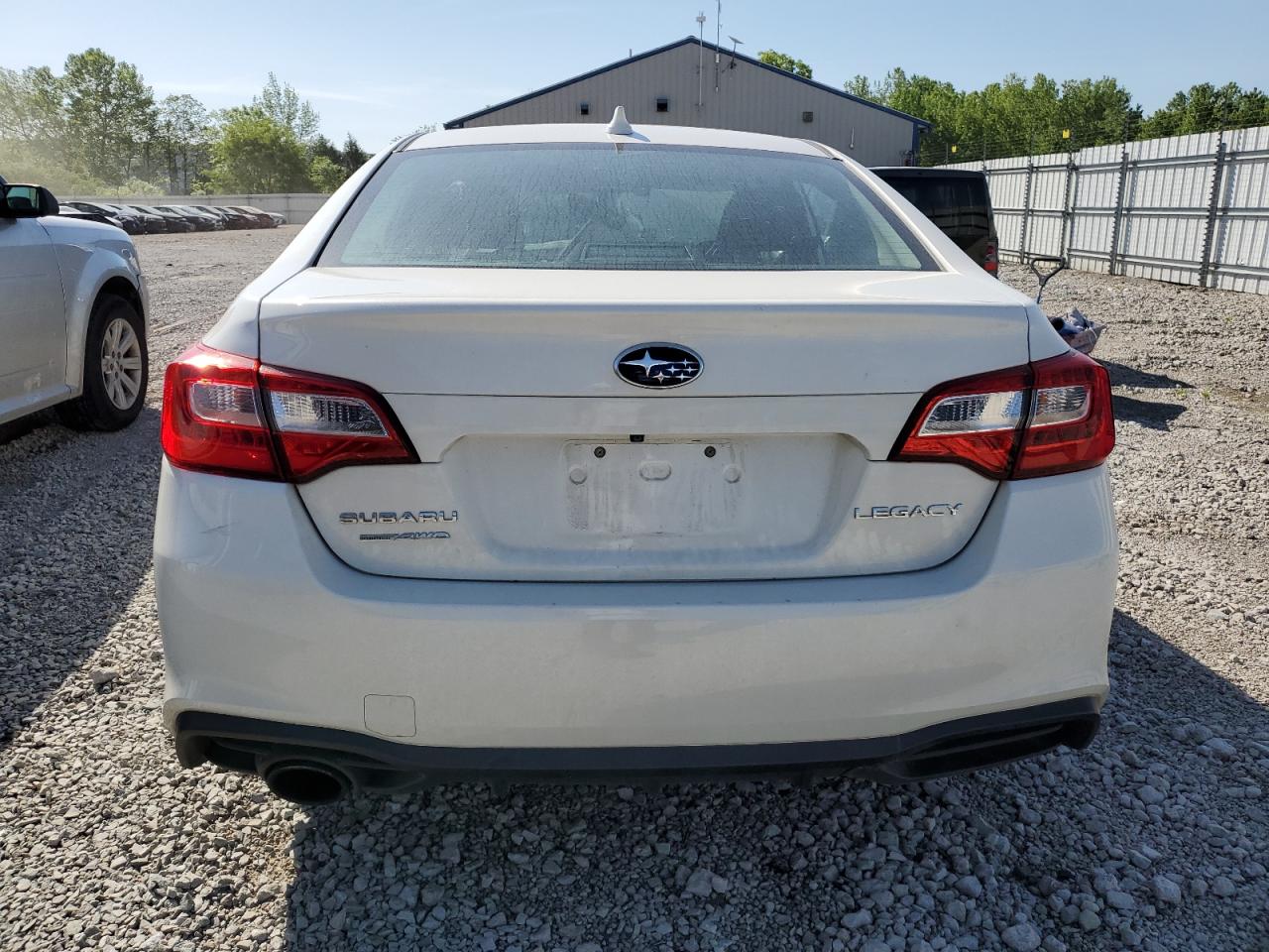 Photo 5 VIN: 4S3BNAF6XK3028661 - SUBARU LEGACY 