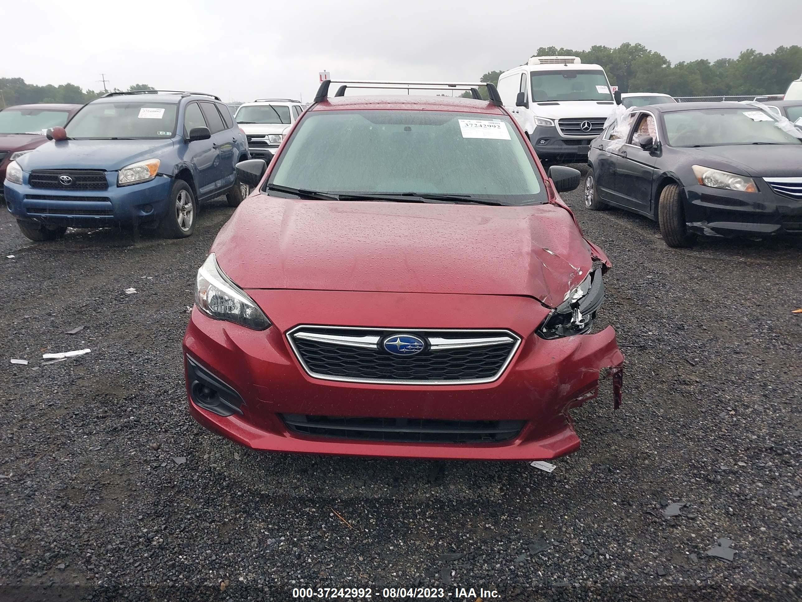 Photo 11 VIN: 4S3GKAA61K3610489 - SUBARU IMPREZA 