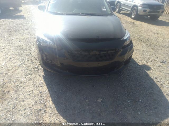 Photo 5 VIN: 4S3GKAA61K3627020 - SUBARU IMPREZA 