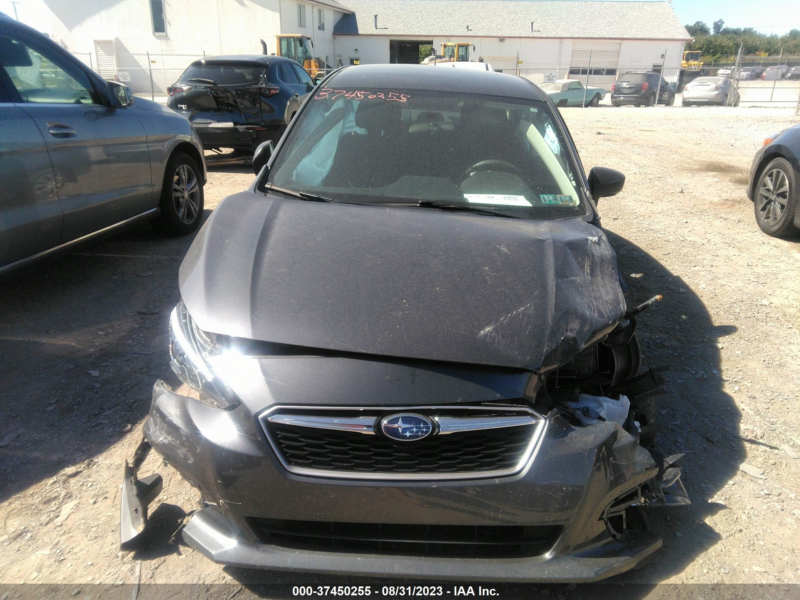 Photo 11 VIN: 4S3GKAA66K3627028 - SUBARU IMPREZA 