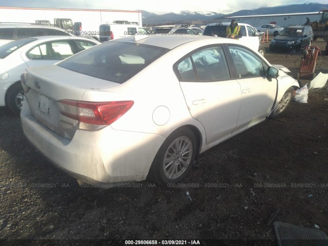 Photo 3 VIN: 4S3GKAD6XJ3624711 - SUBARU IMPREZA 