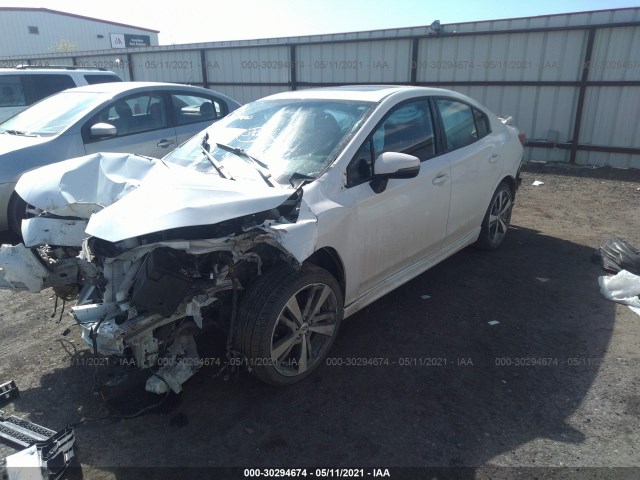 Photo 1 VIN: 4S3GKAM67J3600818 - SUBARU IMPREZA 