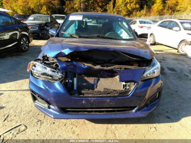 Photo 5 VIN: 4S3GKAM69J3613862 - SUBARU IMPREZA 