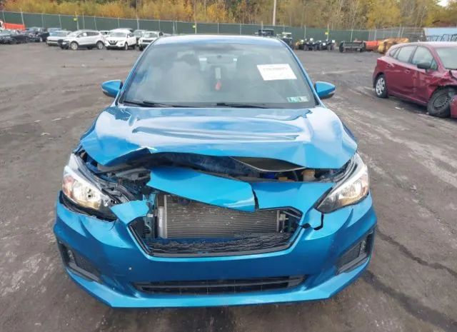 Photo 5 VIN: 4S3GKAM6XK3604508 - SUBARU IMPREZA 