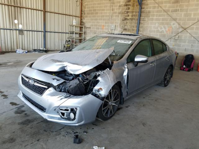 Photo 1 VIN: 4S3GKAT62J3607905 - SUBARU IMPREZA LI 