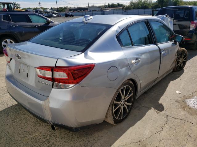 Photo 3 VIN: 4S3GKAU60J3613667 - SUBARU IMPREZA LI 