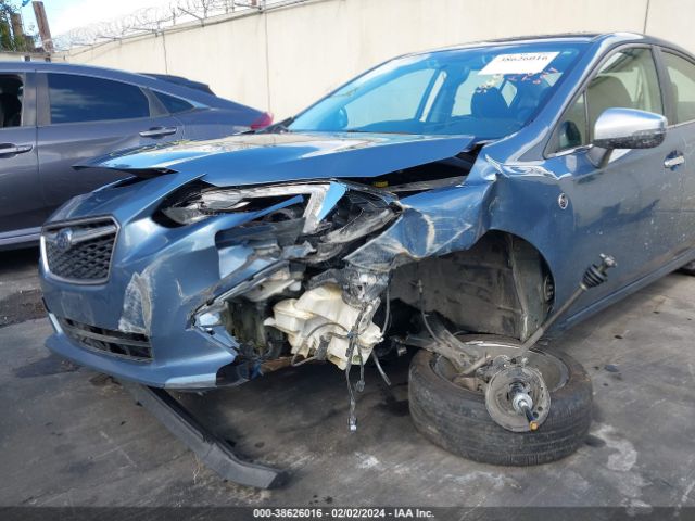 Photo 5 VIN: 4S3GKAU67J3611222 - SUBARU IMPREZA 