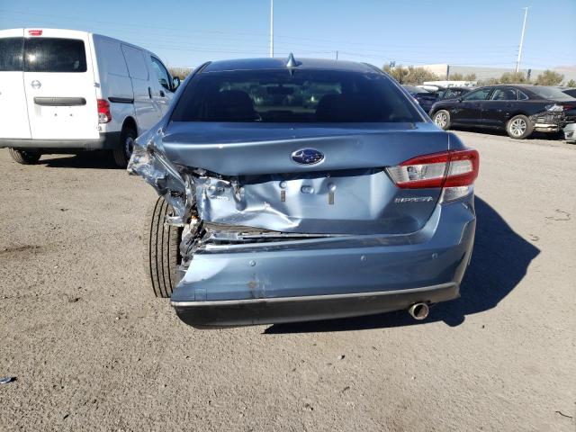 Photo 5 VIN: 4S3GKAU67J3611303 - SUBARU IMPREZA LI 