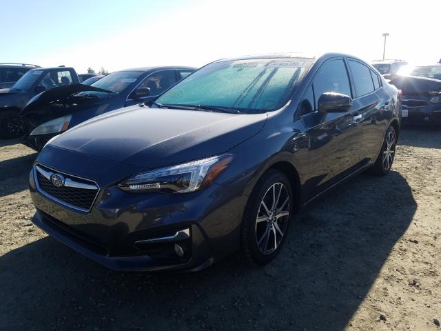 Photo 1 VIN: 4S3GKAU68K3608931 - SUBARU IMPREZA LI 