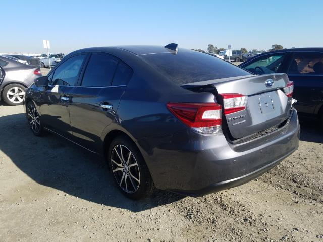 Photo 2 VIN: 4S3GKAU68K3608931 - SUBARU IMPREZA LI 