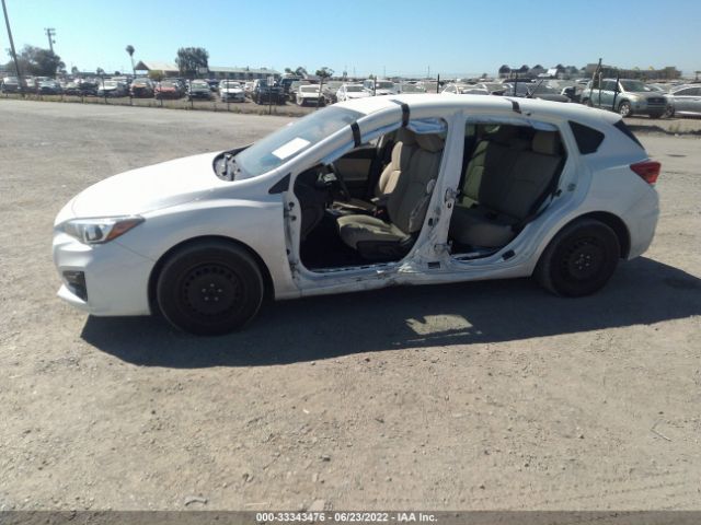 Photo 5 VIN: 4S3GTAA63K3700594 - SUBARU IMPREZA 