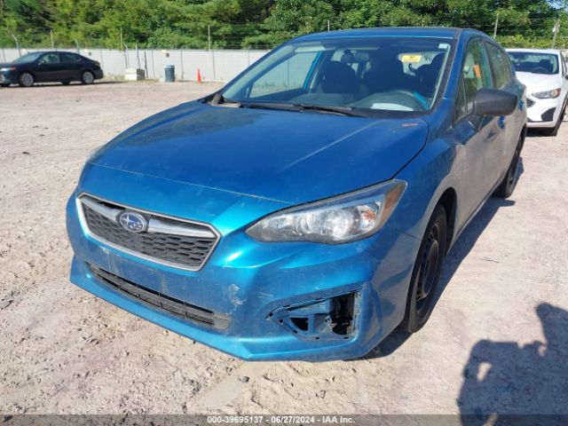 Photo 5 VIN: 4S3GTAA63K3720103 - SUBARU IMPREZA 