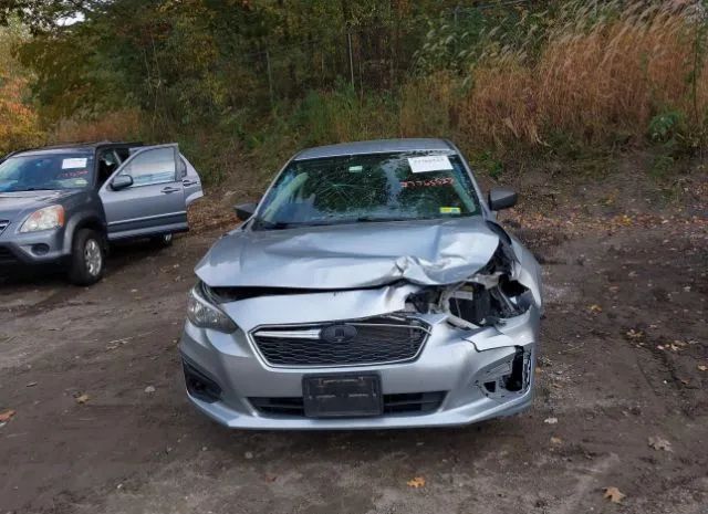 Photo 5 VIN: 4S3GTAA65J3728007 - SUBARU IMPREZA 