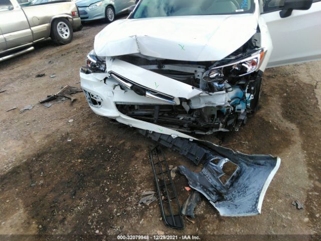 Photo 5 VIN: 4S3GTAA65K3756102 - SUBARU IMPREZA 