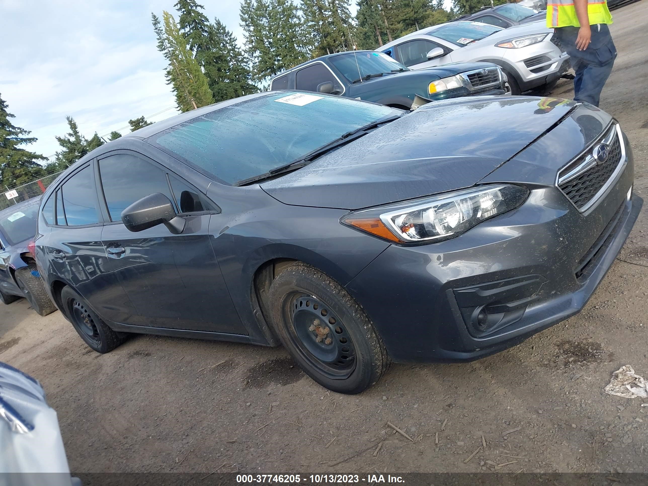 Photo 12 VIN: 4S3GTAA66J3740635 - SUBARU IMPREZA 