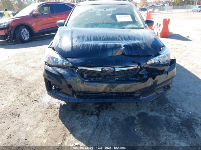 Photo 9 VIN: 4S3GTAA67H3745725 - SUBARU IMPREZA 