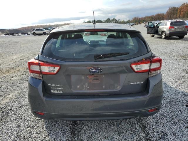 Photo 5 VIN: 4S3GTAA68J3712142 - SUBARU IMPREZA 