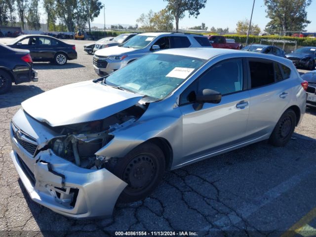 Photo 1 VIN: 4S3GTAA68J3750681 - SUBARU IMPREZA 