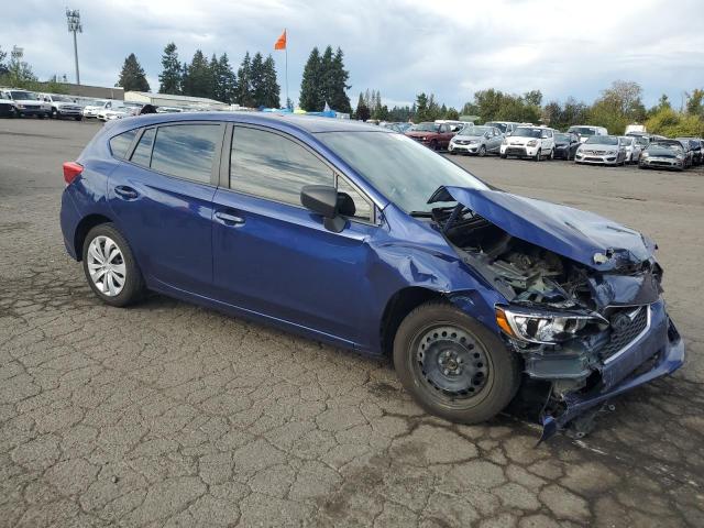 Photo 3 VIN: 4S3GTAA69J3749989 - SUBARU IMPREZA 