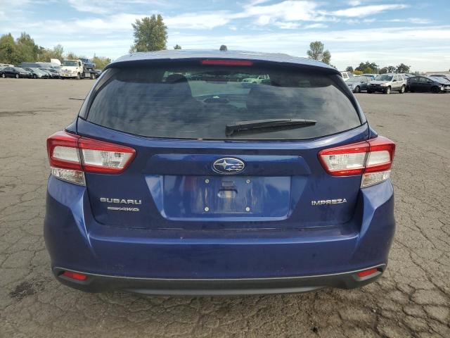 Photo 5 VIN: 4S3GTAA69J3749989 - SUBARU IMPREZA 