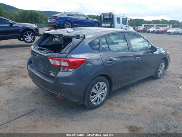 Photo 3 VIN: 4S3GTAA6XK3753681 - SUBARU IMPREZA 