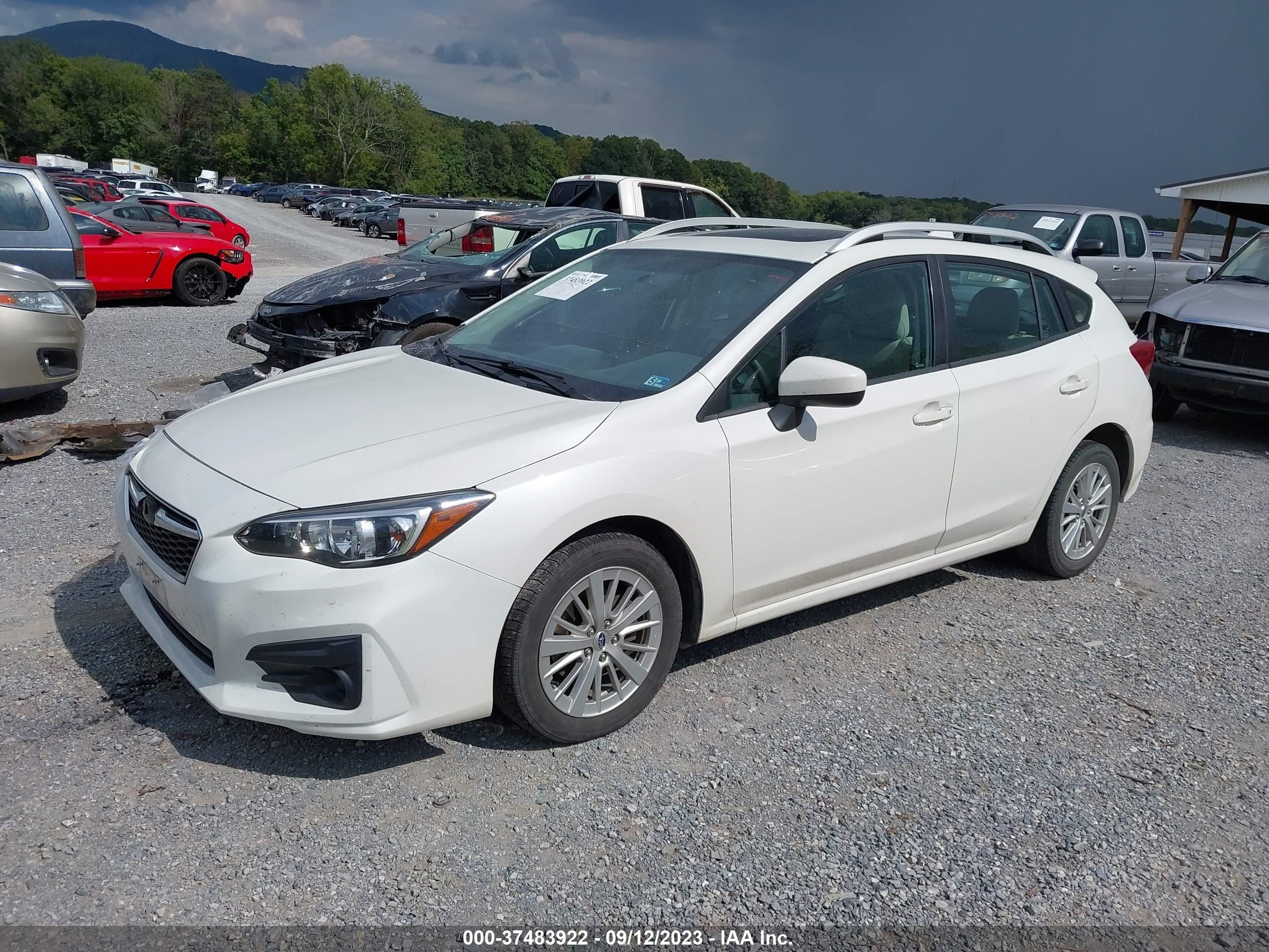 Photo 1 VIN: 4S3GTAB64J3703730 - SUBARU IMPREZA 