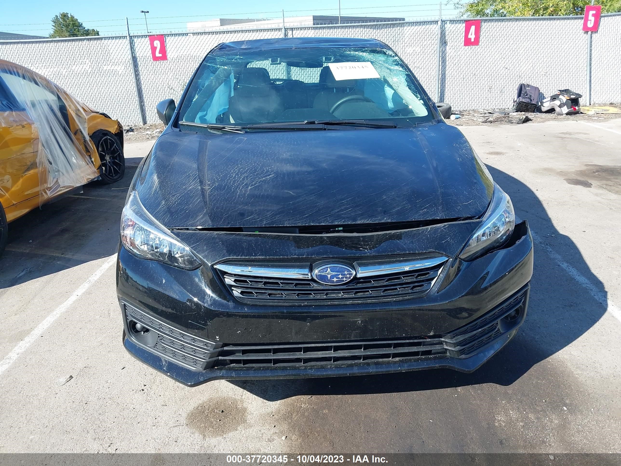 Photo 11 VIN: 4S3GTAB65P3717614 - SUBARU IMPREZA 