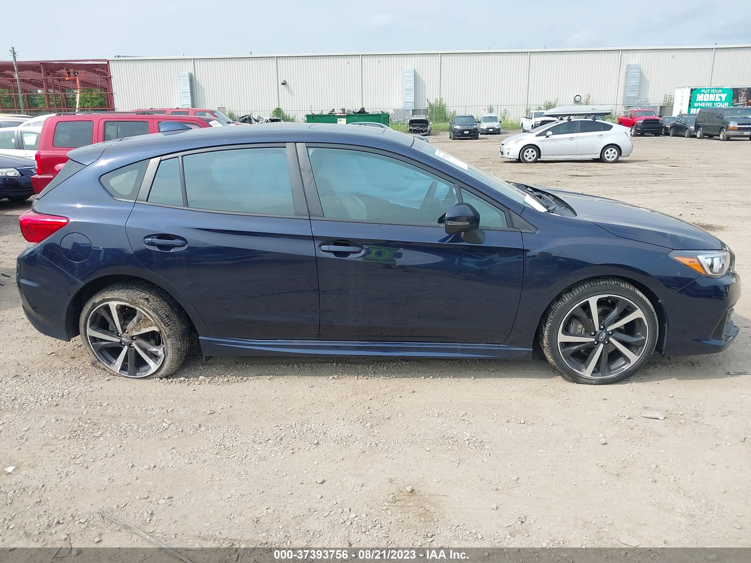 Photo 12 VIN: 4S3GTAM69L3730230 - SUBARU IMPREZA 